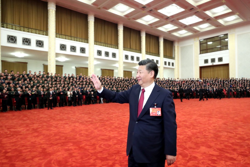 10月25日下午，中共中央總書記、國家主席、中央軍委主席習近平等領導同志在北京人民大會堂親切會見出席黨的十九大代表、特邀代表和列席人員。新華社記者 鞠鵬 攝