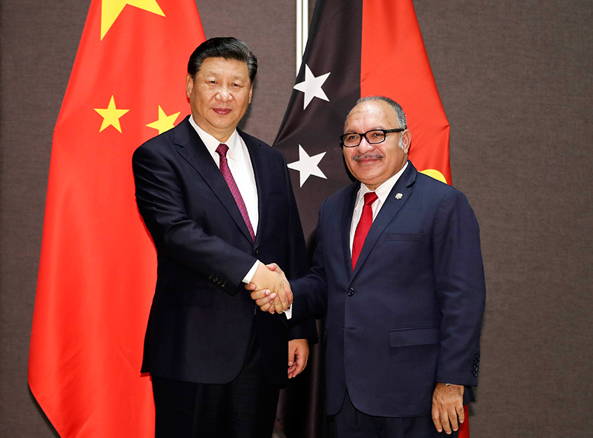 11月16日，國家主席習近平在莫爾茲比港同巴布亞新幾內亞總理奧尼爾會談。 新華社記者 丁林 攝